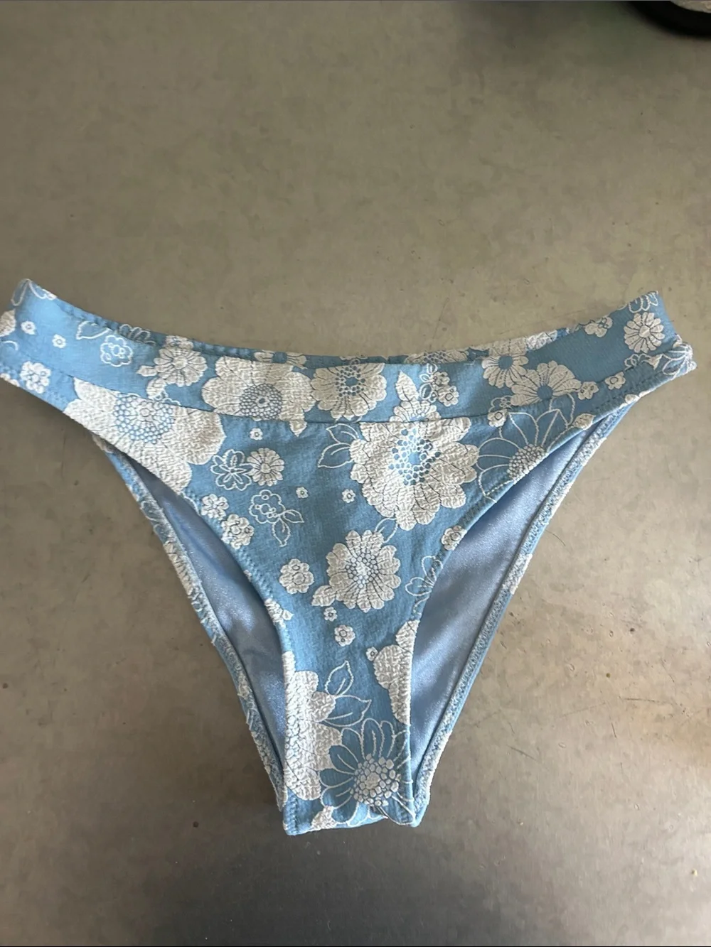 Triangl swimwear, blue white floral bottom size small